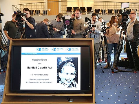 A picture of Claudia Ruf is seen on a video screen as jounalists wait for the start of a press conference in Grevenbroich, Germany. 
