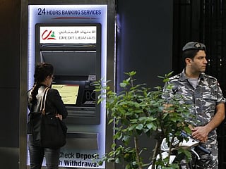 Lebanon ATMs spit out cards as dollars run low