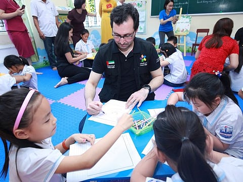 A delegation led by Dr. Tariq Al Gurg, Chief Executive Officer at Dubai Cares recently visited Vietnam to witness the launch of a three-year program that aims to scale-up a librarian training model that will help underserved students adopt and grow a habit of reading. The AED 7,347,000 (USD 2 million) program is set to support the government in increasing the number of child-friendly libraries across the country. The program seeks to establish 320 libraries in 18 districts and publish 5 new book titles in Vietnamese, benefiting over 140,000 children. 
 
The program is part of a long-standing partnership with Room to Read, whose early-grade literacy program was selected as a 2018 Goalkeepers Accelerator, the multiyear campaign from the Bill & Melinda Gates Foundation to accelerate progress towards the UN Sustainable Development Goals. Dubai Cares, part of Mohammed bin Rashid Al Maktoum Global Initiatives, is supporting the government replication and scale-up of the promising program in Vietnam. Dubai Cares’ su