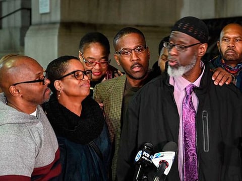 Andrew Stewart, from left, Alfred Chestnut, and Ransom Watkins speak in Baltimore, Maryland on November 25, 2019. The three men who had been incarcerated for 36 years in Maryland were exonerated in the slaying of a Baltimore teenager after a review of their case.