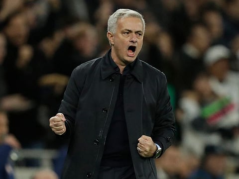 Tottenham's manager Jose Mourinho celebrates his team's second goal.