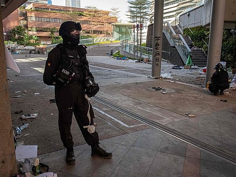Hong Kong police search for any remaining protesters hiding, dangerous explosives and chemicals at the Hong Kong Polytechnic University in the Hung Hom district of Hong Kong on November 28, 2019.