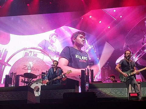 Look: This UAE fan got to play drums with The Killers in Abu Dhabi