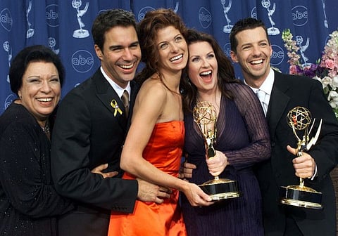 In this Sept. 10, 2000, file photo, Shelley Morrison, from left, Eric McCormack, Debra Messing, Megan Mullally and Sean Hayes celebrate their awards for their work in "Will & Grace" at the 52nd annual Primetime Emmy Awards in Los Angeles.