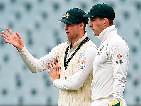 Steve Smith and Australia captain Tim Paine in discussion against Pakistan.