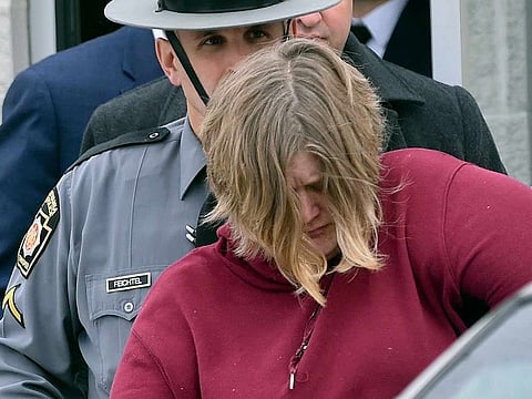 Lisa R. Snyder is led from the Berks County, State Police Barracks in Hamburg, Pennsylvania, Monday, Dec. 2, 2019, following her arraignment for murder charges in the September hanging deaths of two of her children in their Albany Township, Berks County, home.