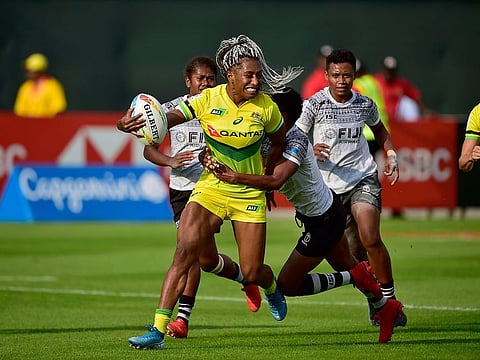 Australia’s Ellia Green dominates the Fiji defence during the HSBC World Rugby Sevens Series Women’s tournament taking place at Sevens Stadium.