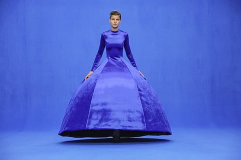 A model presents a look from the Balenciaga spring 2020 collection in Paris on Sept. 29, 2019. Pantone has declared Classic Blue its color of the year for 2020.