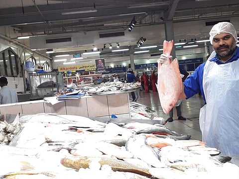 Mohammad Ashraf, fish trader. 

Pictureby Anwar Ahmad
