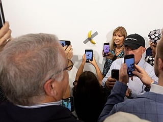 Man eats $120,000 piece of art - a banana taped to wall