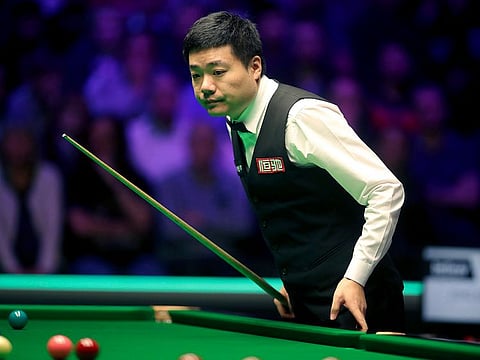 Snooker player Ding Junhui in action.