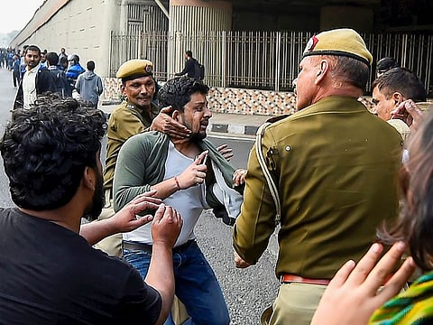 JNU students engaged in a scuffle with the police during their march from the University campus to Rashtrapati Bhavan to 'save public education', in New Delhi, Monday, Dec. 9, 2019. 