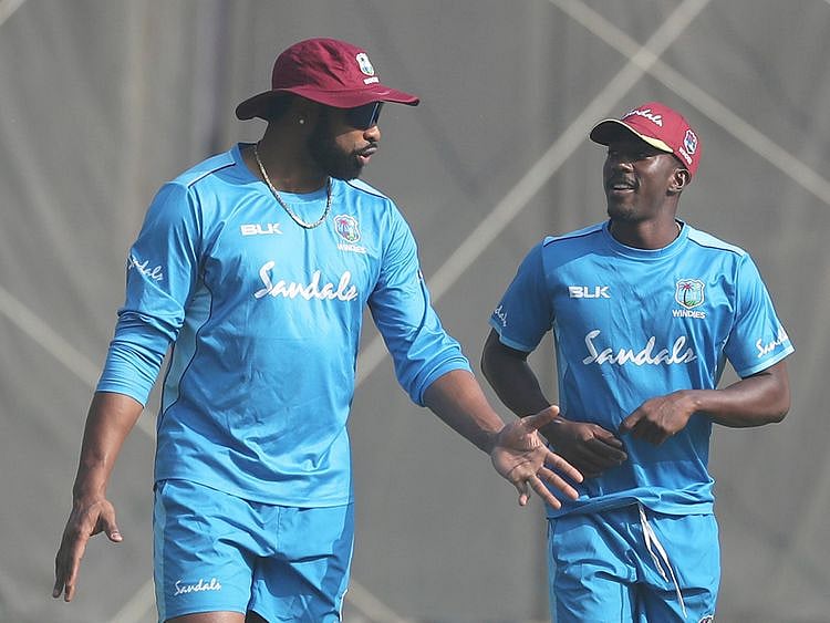 Kieron Pollard chats with Hayden Walsh