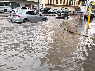 Photos: Gulf News readers share pictures of dark clouds, rain and flooded roads in the UAE