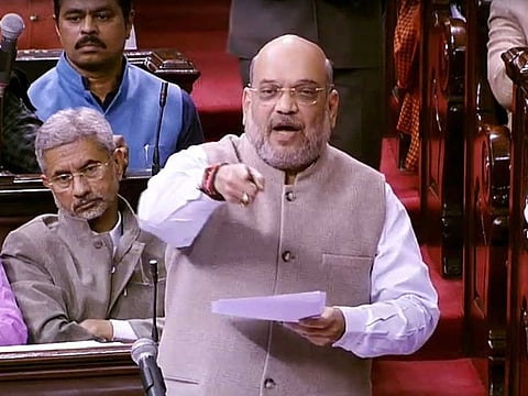 Union Home Minister Amit Shah speaks in Rajya Sabha during the discussions on the Citizenship (Amendment) Bill 2019, during the winter session of Parliament in New Delhi on Wednesday. 