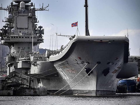 A file photo taken on May 19, 2018 shows Russian aircraft carrier Admiral Kuznetsov tied up at a Rosatomflot moorage of the Russian northern port city of Murmansk.