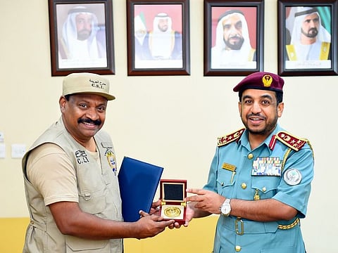 Jagadeesh Panicker receives a warm farewell and appreciation for his service from Brigadier Mohammad Rashid Bayat, Director of Sharjah Police Operations
