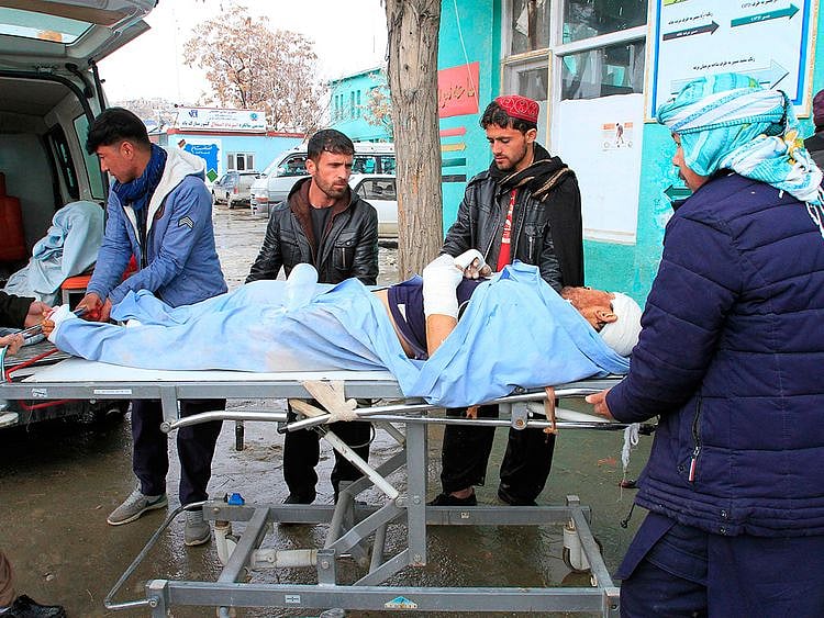 A wounded man is brought to a hospital