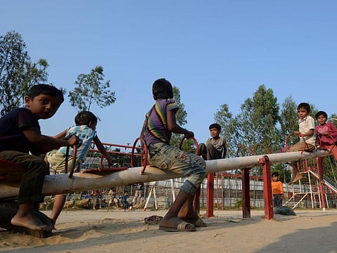 Rohingya children play at the Jamtola refugee camp in Ukhia on December 9, 2019.