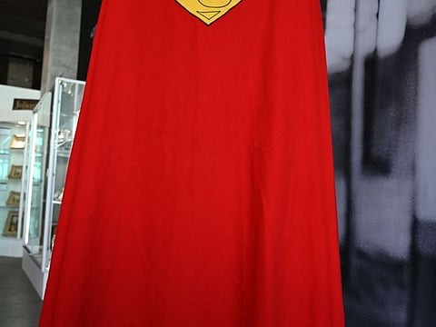 An original Superman cape worn by actor Christopher Reeve in the 1978 "Superman" film (estimate $100,000 -2000,000 $ USD) is displayed at Julien's Auctions house on December 13, 2019 ahead of Julien's Icons & Idols: Hollywood Auction which takes place on December 16, 2019.      / AFP / Robyn Beck