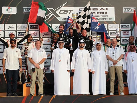 Maritimo, champions of XCAT World Powerboating Championship last year, poses with the silverware in Dubai.