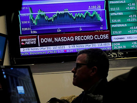 Traders work on the floor at the New York Stock Exchange (NYSE) in New York, U.S., December 17, 2019.