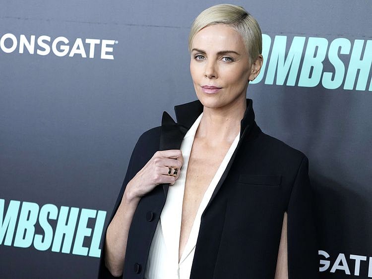 tab 191218 Charlize Theron 1-1576660113503