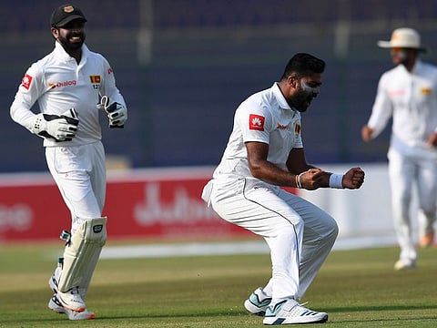 Sri Lanka's Lahiru Kumara celebrates after taking the wicket of Pakistan's Yasir Shah during the first day of the second Test in Karachi on December 19, 2019