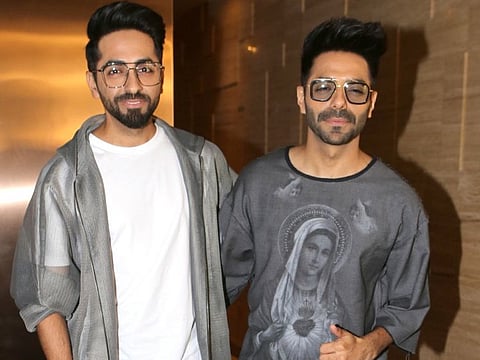 Mumbai: Actor Ayushmann Khurrana along with his brother and actor Aparshakti Khurana seen at Mumbai's Juhu on Oct 28, 2018. (Photo: IANS)