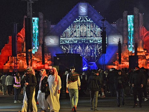 Saudi fans attend the "MDL Beast Fest", an electronic music festival, held in Banban on the outskirts of the Saudi capital Riyadh on December 19, 2019. Saudi Arabia's de facto ruler, Crown Prince Mohammed bin Salman, Prince Mohammed has sought to shake off his country's ultra-conservative image -- lifting a ban on cinemas and women drivers while allowing gender-mixed concerts and sporting extravaganzas. The relaxed social norms in a kingdom have been welcomed by many Saudis, two-thirds of whom are under 30.
 / AFP / Fayez Nureldine