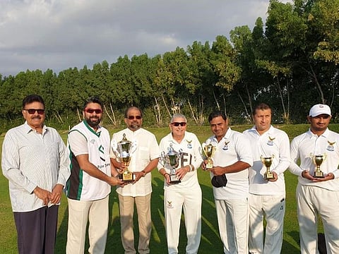 Winner and runner-up captains of the Oasis Chemicals Cup with individual award winners and sponsors of the event. 