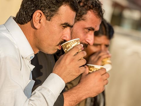 Left to Right, Imtiaz Hussain, Ashfaq Nawaz and Mitha Khan have karak Tea consumers at Eat and Drik in Ras Al Kor. Dubai. Photo: Antonin Kélian Kallouche/Gulf News