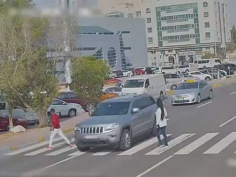 Abu Dhabi Police warn drivers to give way to pedestrians.