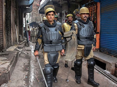 File photo: Police personnel conduct a flag march during the ongoing protest against Citizenship Amendment Act (CAA) in Mathura, on December 21, 2019. 