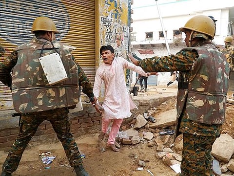 File photo: Police personnel conduct a flag march during the ongoing protest against Citizenship Amendment Act (CAA) in Mathura, on December 21, 2019. 