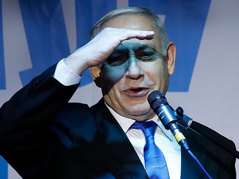 Israeli Prime Minister Benjamin Netanyahu addresses Likud party supporters during an electoral meeting in the Israeli city of Petah Tikva near Tel Aviv on December 18, 2019. 
