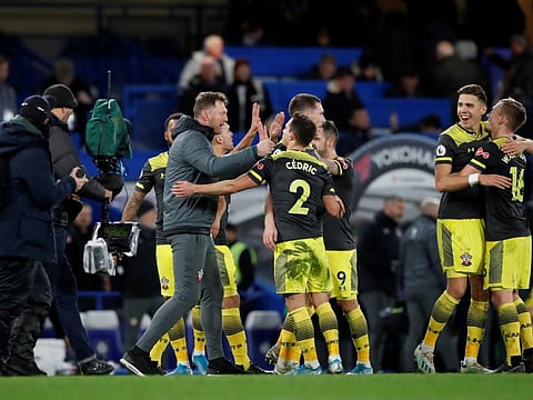 Reuters Southampton manager Ralph Hasenhuttl celebrates after the match with Cedric Soares and teammates.