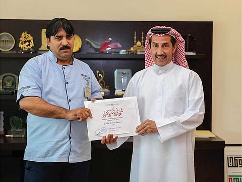 Shamshad Malang was honoured by Sharjah RTA on Thursday for returning Dh15,000 discovered in his cab. 