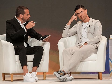 Cristiano Ronaldo looks thoughtful during his interaction with TV pundit Rui Pedro at the 14th Dubai International Sports Conference today.