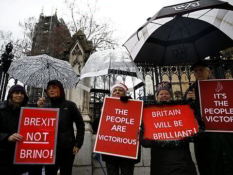 Pro-Brexit protesters outside the Houses of Parliament in London on December 19, 2019.