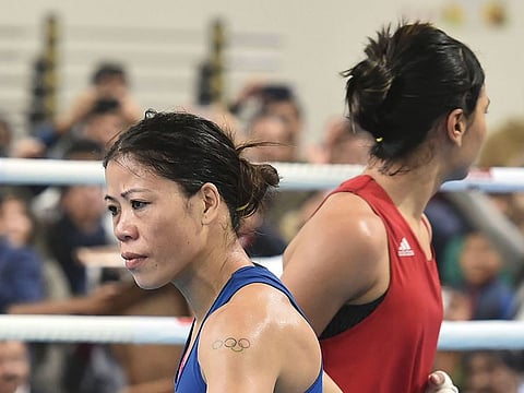 Boxer Mary Kom during her bout against Nikhat Zareen in the 51kg category finals of the women's boxing trials for Olympics 2020 qualifiers, in New Delhi.