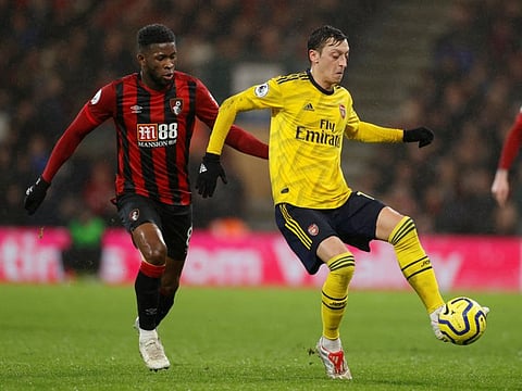 New Arsenal coach Mikel Arteta is pinning a lot of hope on German playmaker Mesut Ozil (right) to find his touch back.