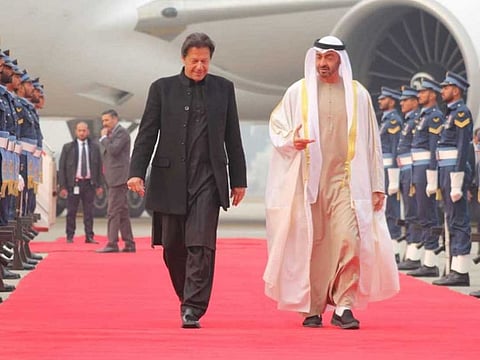 Pakistan Prime Minister Imran Khan receives Mohammad Bin Zayed at Nur Khan base in Islamabad.