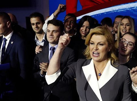 Croatia’s rightwing president Kolinda Grabar-Kitarovic has stayed on course for re-election after securing enough votes on Sunday to win a place in a run-off vote next month
