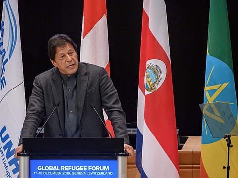 Pakistan's Prime Minister Imran Khan delivers a speech during the opening of the Global Refugee Forum in Geneva
