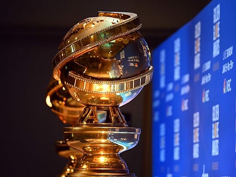 (FILES) In this file photo taken on December 9, 2019, Golden Globe statues are set by the stage ahead of the 77th Annual Golden Globe Awards nominations announcement in Beverly Hills. Hollywood's biggest stars gather on January 5, 2020, for the glitzy Golden Globes, the first major awards show of a packed season that looks set to mark Netflix's coming-of-age in Tinseltown. The celebrity-filled gala in Beverly Hills is billed as the most raucous event in the showbiz calendar, where success helps create buzz ahead of next month's Oscars. / AFP / Robyn BECK / TO GO WITH AFP STORY by Andrew MARSZAL and Javier TOVAR, "Golden Globes rev up award season with Netflix in pole position"