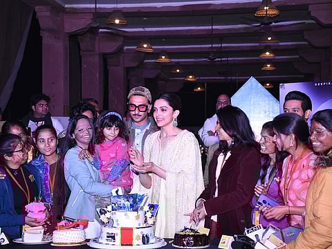 Actress Deepika Padukone with her husband and actor Ranveer Singh and acid attack survivors celebrates her birthday during a programme in Lucknow.