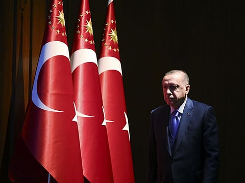 Turkey's President Recep Tayyip Erdogan arrives to deliver a speech at an event in Ankara, Turkey, Monday, Dec. 30, 2019. 