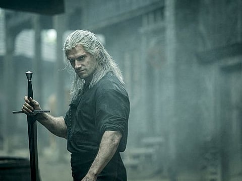 Henry Cavill plays the title character in “The Witcher.” MUST CREDIT: Katalin Vermes/Netflix
