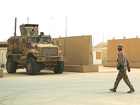 In this Nov. 8, 2017, file photo, U.S. Marines are stationed in Ain Al Asad air base in Iraq. 